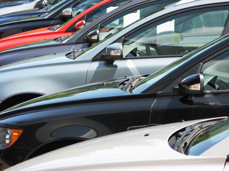 The pros and cons of buying from car dealerships
